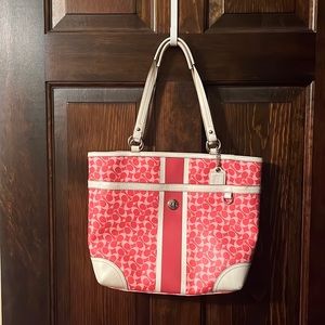 Coach traditional C tote style purse.  Pink shades and white.
